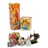 A collection of tinplate and plastic toys to include a Marx Mr.