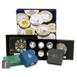 Elizabeth II - Two cases of World War One commemorative silver proof coins,