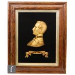 A mid 19th Century gilt metal side profile bust of Prince Consort,