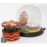 A 20th Century electric operated ferris wheel and carousel automaton in 19th Century glass dome,