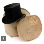 A top hat by Tress & Co London retailed by Sidney A.