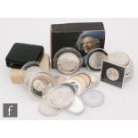 Elizabeth II - A collection of silver proof crowns to include various subjects and commemorative