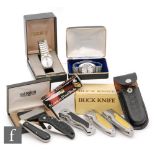 A collection of modern knives to include hunting and lock knives, Smith and Wesson, hip flasks, etc.