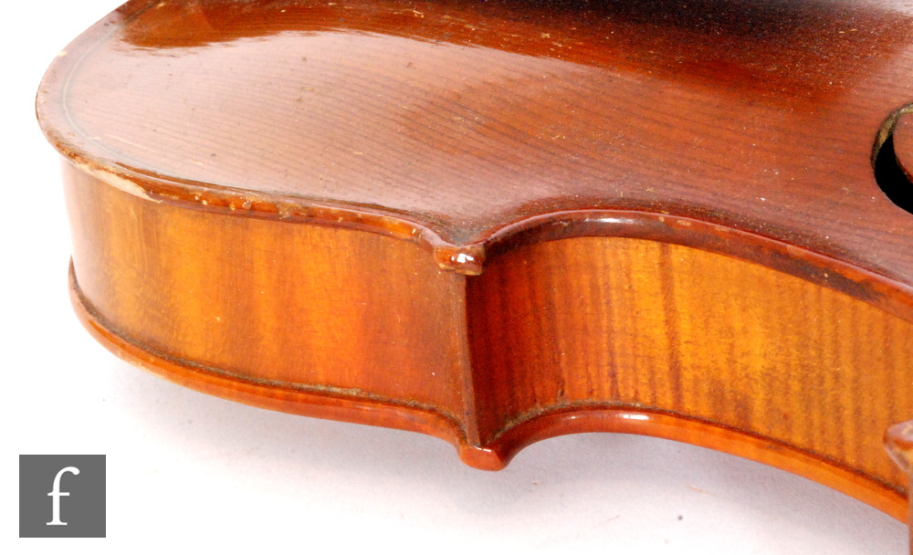 A 1920 to 1930s violin, the reverse stamped Stainer, length of back 35.5cm and with a bow, cased. - Image 15 of 17