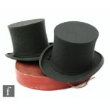 Two folding opera black top hats by Dunn & Co London in original box (2)