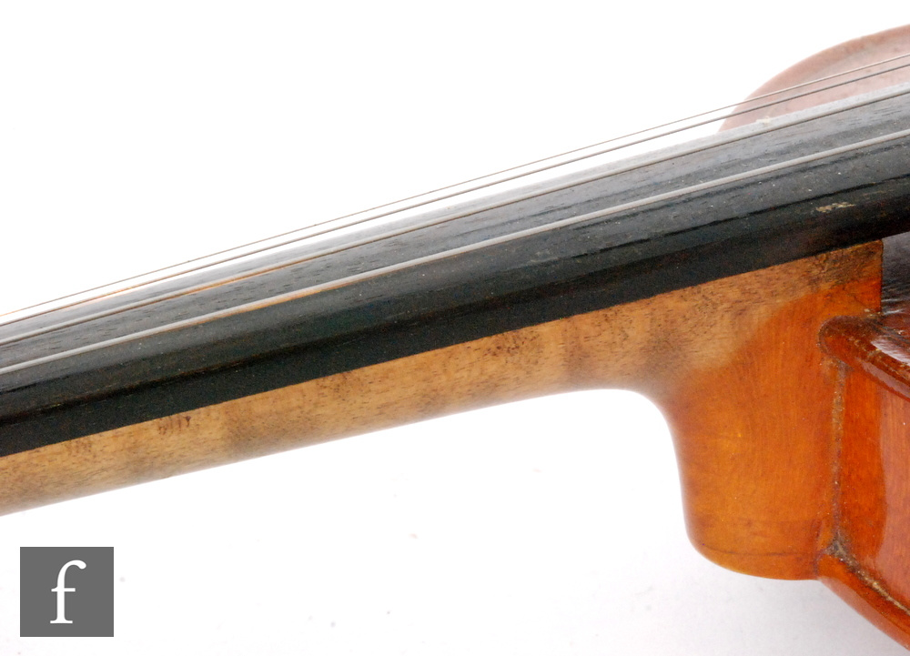 A 1920 to 1930s violin, the reverse stamped Stainer, length of back 35.5cm and with a bow, cased. - Image 12 of 17