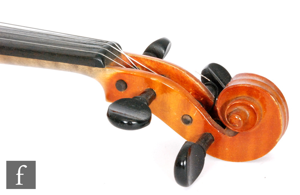 A 1920 to 1930s violin, the reverse stamped Stainer, length of back 35.5cm and with a bow, cased. - Image 5 of 17