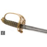 A George V artillery officers dress sword and scabbard with pierced D shaped guard and ray skin
