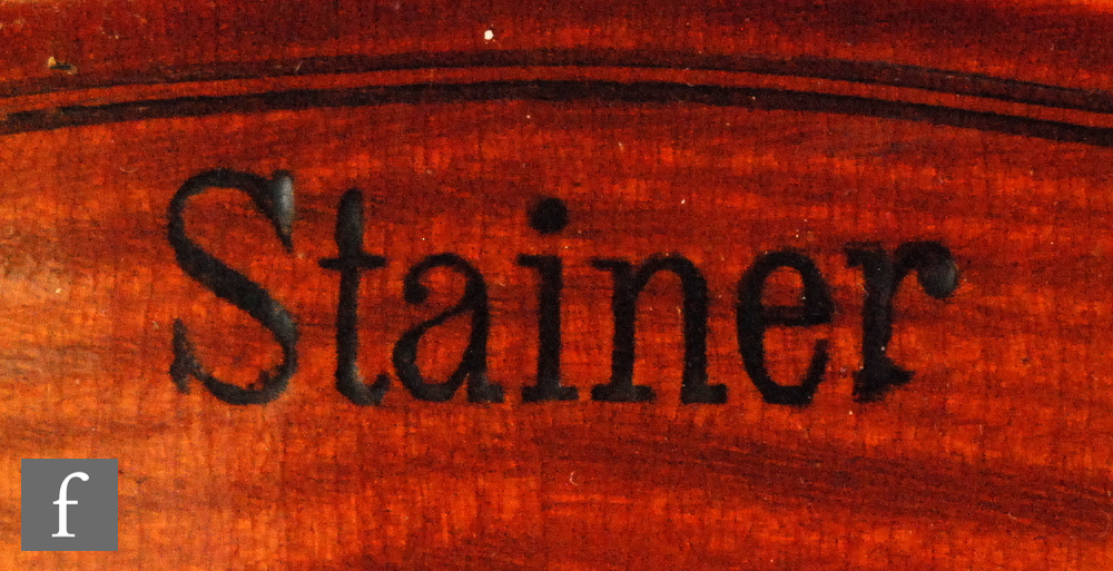 A 1920 to 1930s violin, the reverse stamped Stainer, length of back 35.5cm and with a bow, cased. - Image 3 of 17