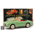 A Schuco Elektro Phaenomenal 5503 Mercedes 190SL tinplate model in green with opening boot,