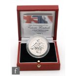 Elizabeth II - A 2004 five pound platinum Piedfort coin, No 136, cased with certificate.