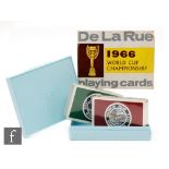 An unopened pack of two sets of 1966 World Cup De La Rue playing cards, boxed.