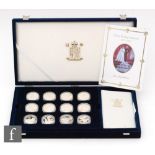 Elizabeth II - Twenty four silver proof cameo inset coins to commemorate the Golden Wedding