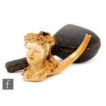 A large 19th Century carved meerschaum pipe in the form of a lady with plumed hair tied by a