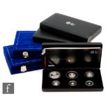 Elizabeth II - Two United Kingdom Millennium thirteen proof coin sets and three Britannia six coin