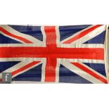 A Union Jack linen flag, 123cm x 63cm and a similar flag, S/D.