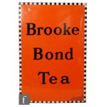 A Brooke Bond tea enamel sign, black on orange,