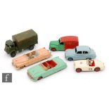 Six Dinky Toys diecast model cars, a #132 Packard Convertible in green with red interior and hubs,