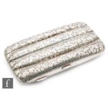 A Victorian silver four sectional hallmarked silver cigar case with engraved floral decoration,