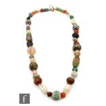 Roman 2nd to 4th Century AD - A string of multi coloured and polychrome glass beads,