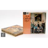 A collection of 1960s rock and roll vinyl records to include The Hollies 'In The Hollies Style',
