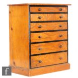 A Victorian stained pine and part ebonised collectors cabinet of six graduated drawers,