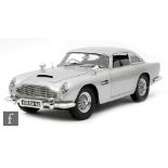 A detailed 1:8 scale model of James Bond's Aston Martin DB5 from 'Goldfinger',