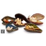 A collection of five late 19th to early 20th Century carved Meerschaum pipes,