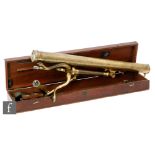 A 19th Century brass telescope by I Ramage Aberdeen on folding tripod base with accessories in a