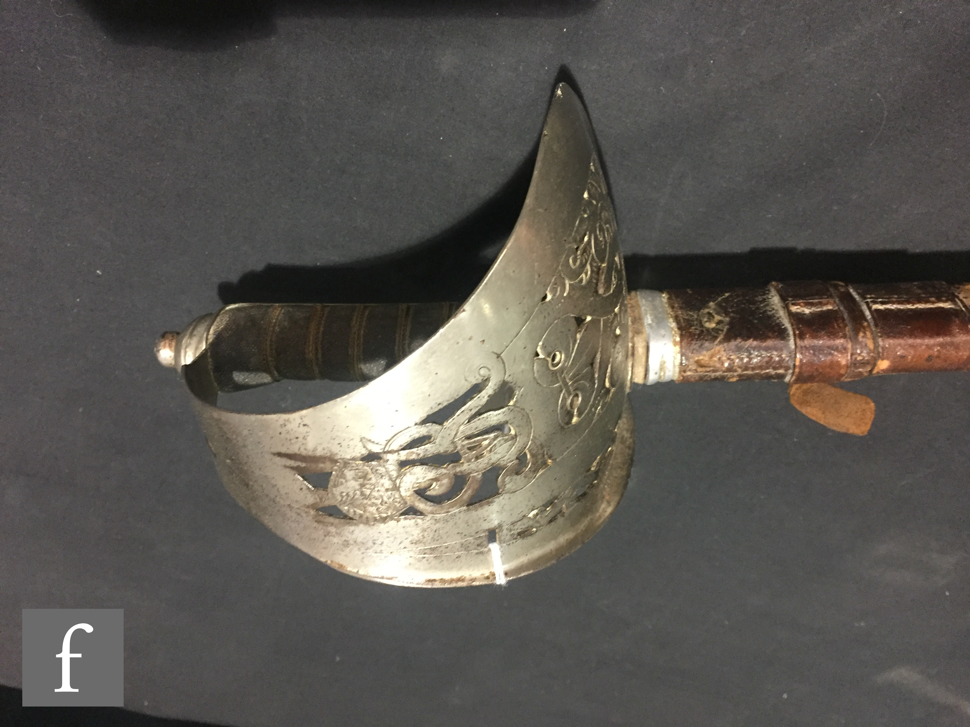 An early 20th Century Artillery officers sword and leather scabbard, - Image 2 of 5
