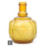 A Haywards amber glass hand fire grenade of lozenge panel and ribbed form,