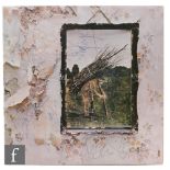 A Led Zeppelin fully signed copy of Led Zeppelin IV LP, signed to the front in blue ink,