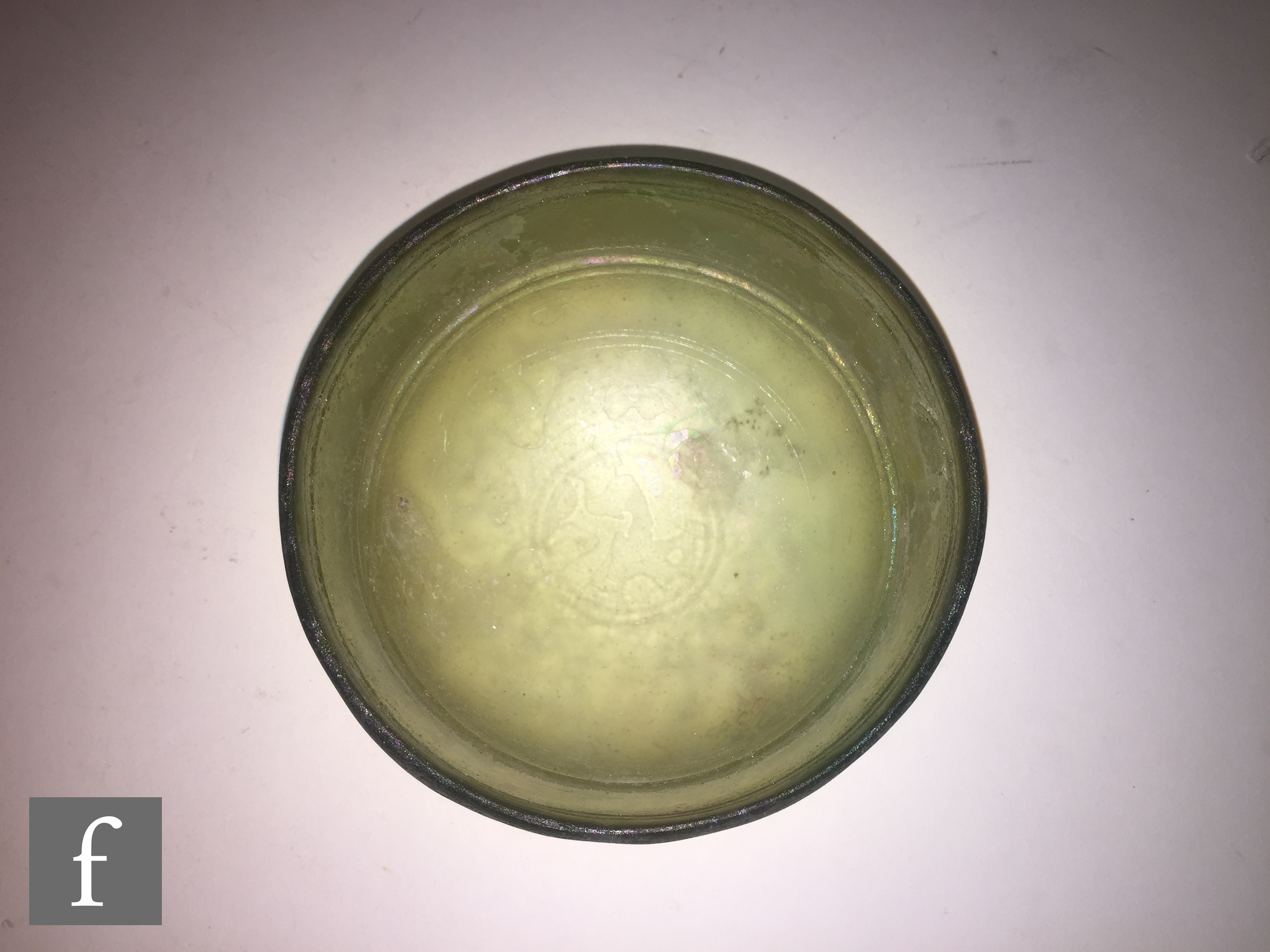 Roman 2nd to 4th Century AD - A pale green glass shallow bowl with traces of iridescence and - Image 4 of 5