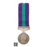 A Queen Elizabeth II General Service medal with Malaya bar, awarded to 23276940 Sig. J.W.
