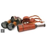A pair of early 20th Century sporting binoculars,