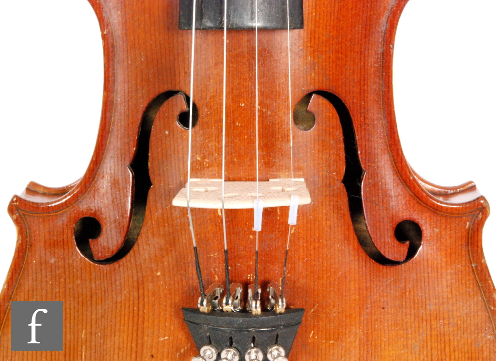 A 1920 to 1930s violin, the reverse stamped Stainer, length of back 35.5cm and with a bow, cased. - Image 9 of 17