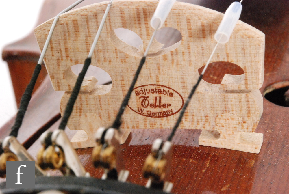 A 1920 to 1930s violin, the reverse stamped Stainer, length of back 35.5cm and with a bow, cased. - Image 7 of 17