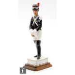 A Royal Worcester figure Gendarme of the Gendarmeria Pontificia, from The Papal Series, number 23 of