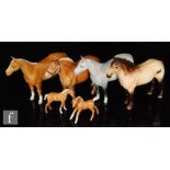 A collection of Beswick animals, mainly horses, to include a dapple grey Huntsman Horse, piebald