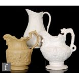 Two Victorian parian ware jugs, one with relief moulded succulent leaves, height 21.5cm, the other