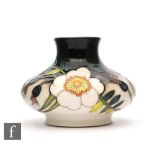 A Moorcroft Pottery vase in the Scotch Rose pattern designed by Nicola Slaney for the Royal