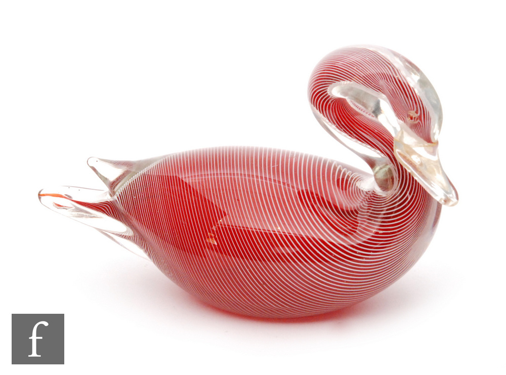 A later 20th Century Murano glass sculpture in the form of a stylised swan, ruby with white canes