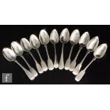 Nine hallmarked silver George II and later fiddle pattern dessert spoons with a similar old