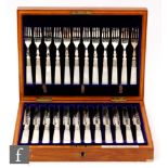 A cased set of twelve silver plated and mother of pearl handle dessert knives and forks each with