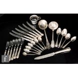 A parcel lot of assorted hallmarked silver flatware to include tea spoons, fruit knives and forks,