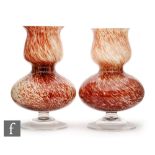 A pair of 1930s WMF Ikora Kristal vases with a circular spread foot rising to a compressed ovoid