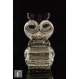 A post war clear crystal glass owl vase by Lars Hellsten for Skruf, of two tiers with alternating
