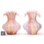 A pair of late 19th Century continental posy vases, possibly Harrach, of low shouldered form with