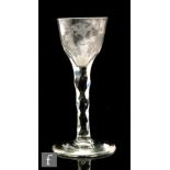 An 18th Century drinking glass circa 1780, round funnel bowl with slightly everted rim engraved with