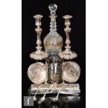 Small parcel lot of silver plated items to include a pair of candlesticks, a pair of bottle